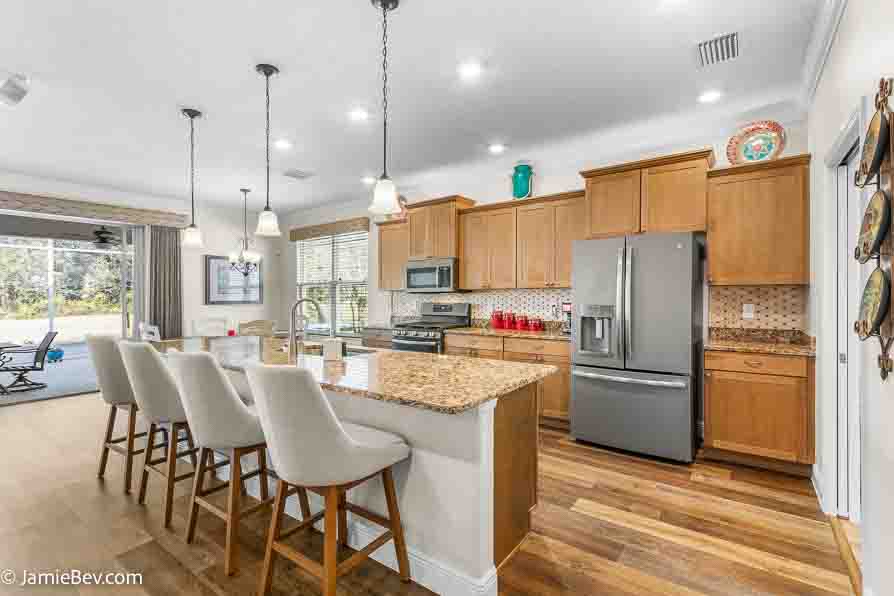 Welcome to 26670 Otter Creek Lane, a beautifully updated home in Arlington Ridge.