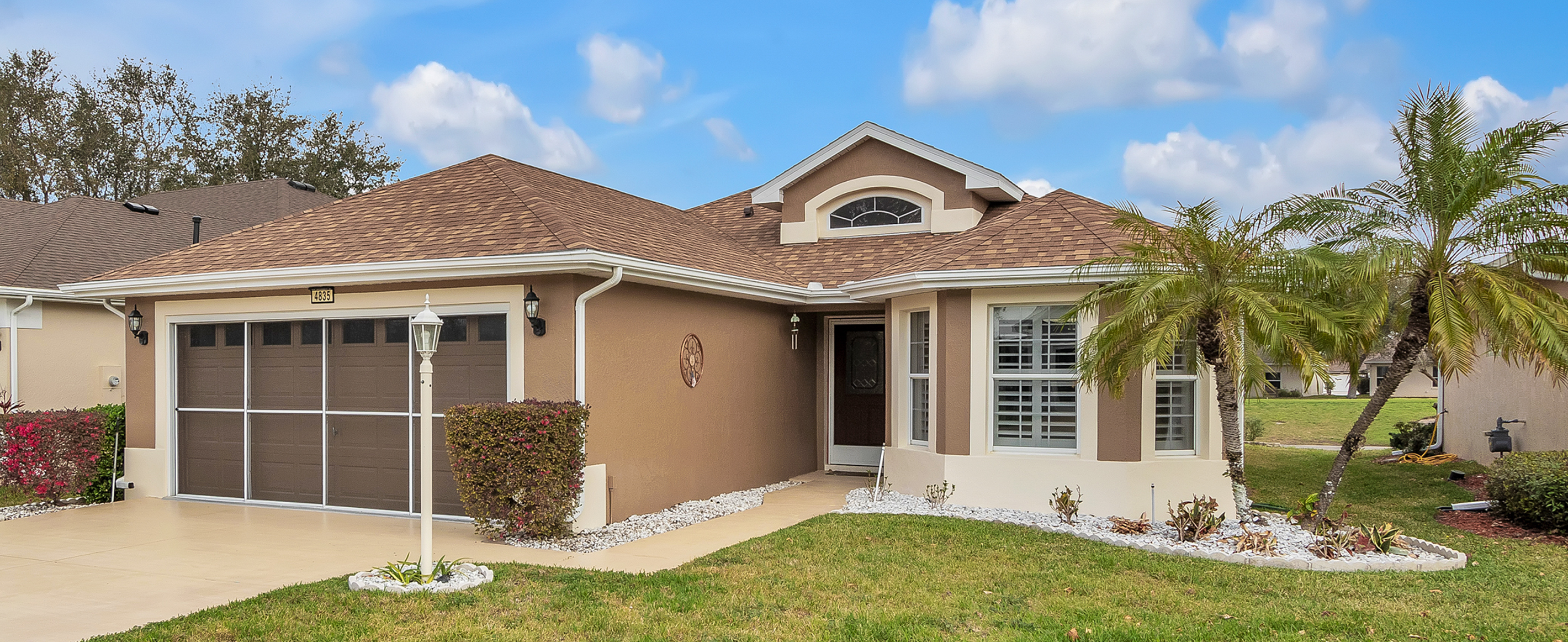 Front view of 4835 Kelso St., a move-in-ready home in Royal Highlands, a 55+ community in Leesburg, Florida.