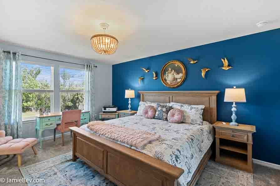 Large Owner’s Suite with a walk-in closet and en suite bathroom.