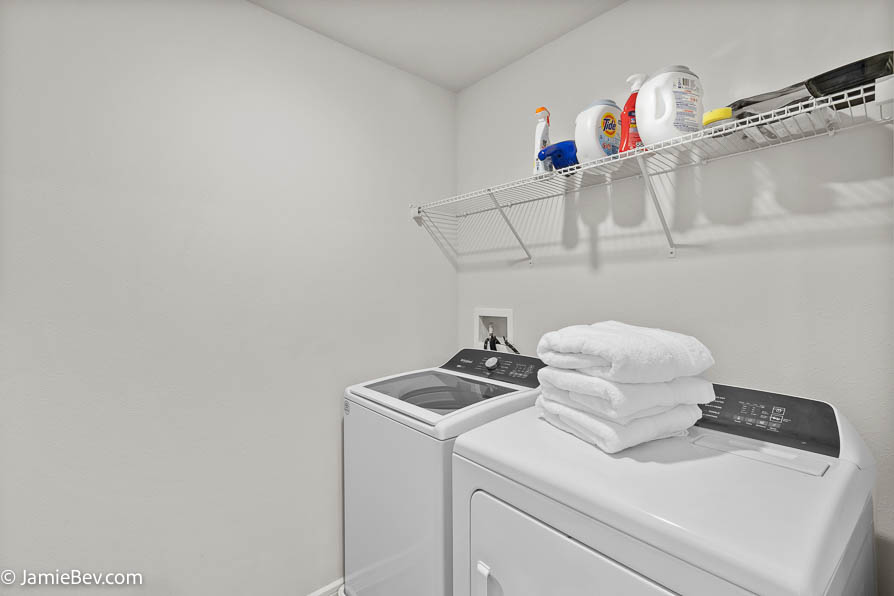 Large Owner’s Suite with a walk-in closet and en suite bathroom and upstairs laundry room.