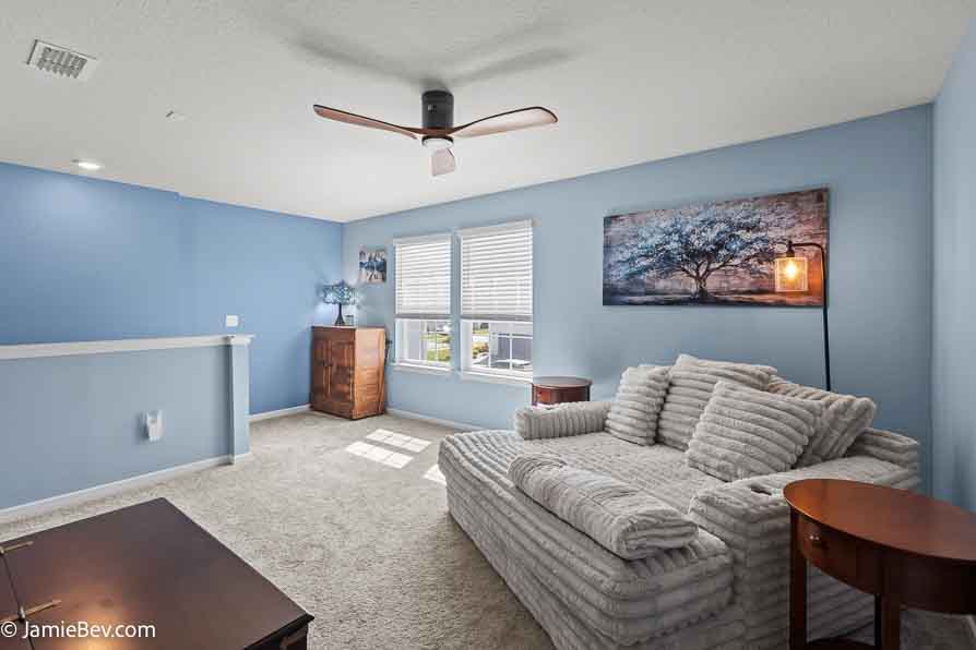 Open-concept floor plan with natural light, ideal for entertaining or relaxing with family.