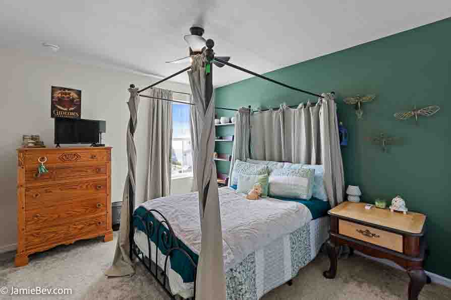 Open-concept floor plan with natural light, ideal for entertaining or relaxing with family.