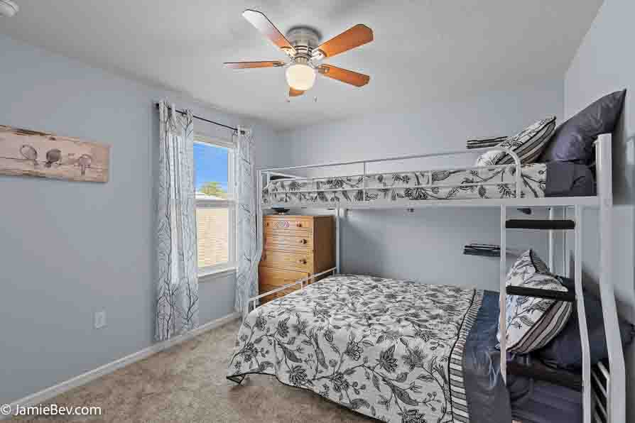 Open-concept floor plan with natural light, ideal for entertaining or relaxing with family.