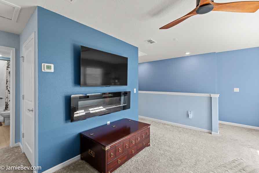 Open-concept floor plan with natural light, ideal for entertaining or relaxing with family.