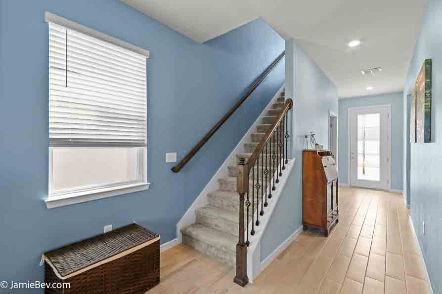 Open-concept floor plan with natural light, ideal for entertaining or relaxing with family.