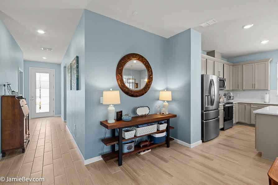 Open-concept floor plan with natural light, ideal for entertaining or relaxing with family.