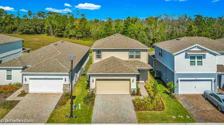 Front exterior of 17291 Saw Palmetto Ave, a 4-bedroom home in Serenoa Lakes, Clermont, FL.