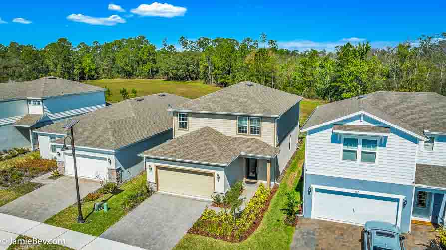 Front exterior of 17291 Saw Palmetto Ave, a 4-bedroom home in Serenoa Lakes, Clermont, FL.