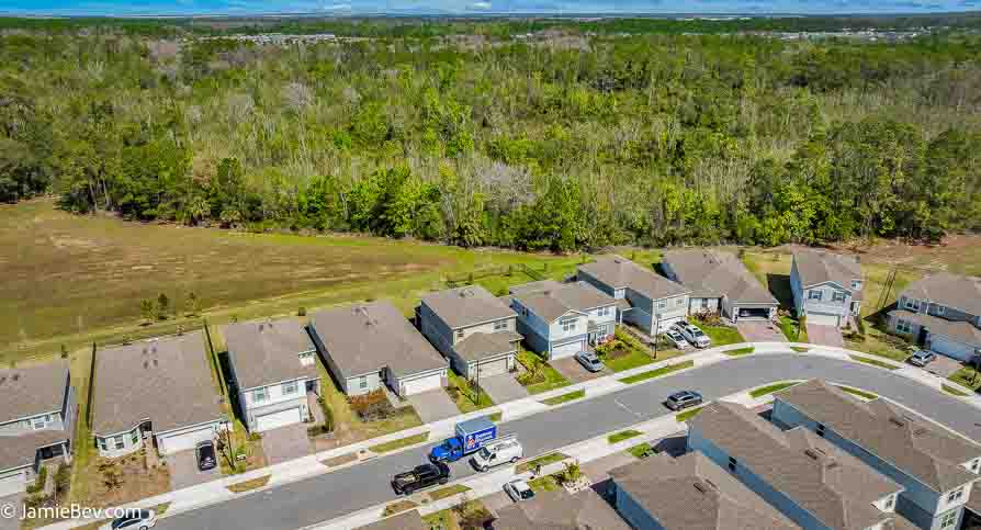 Arial view of 17291 Saw Palmetto Ave, a 4-bedroom home in Serenoa Lakes, Clermont, FL.