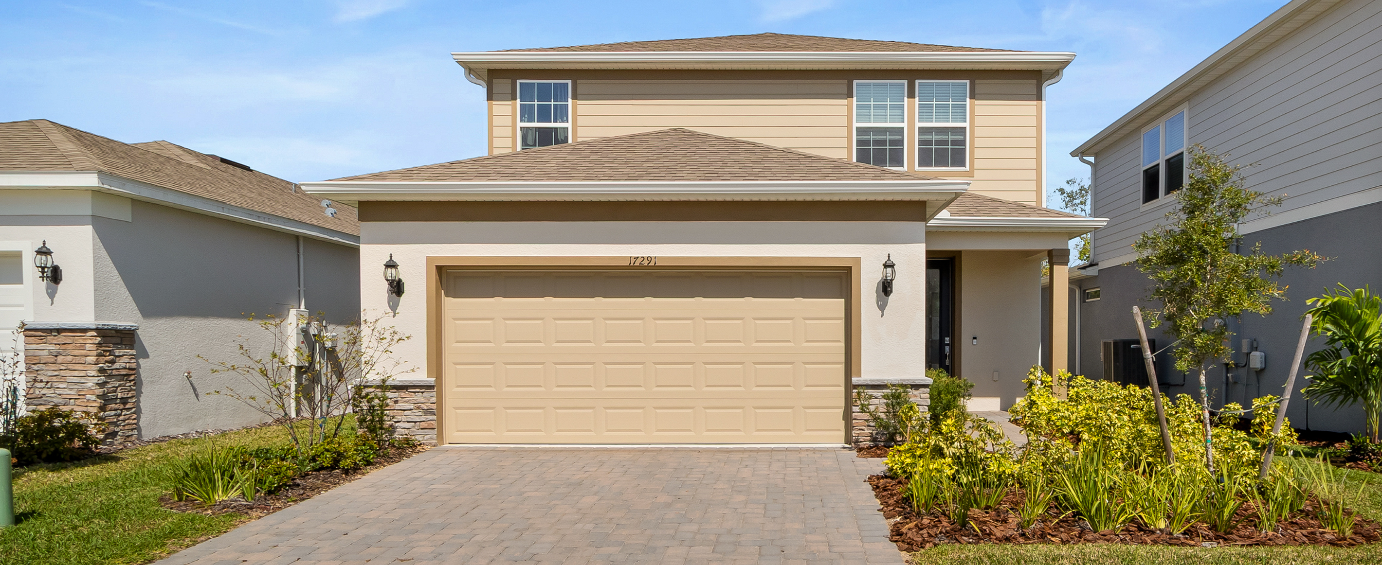 Front exterior of 17291 Saw Palmetto Ave, a 4-bedroom home in Serenoa Lakes, Clermont, FL.