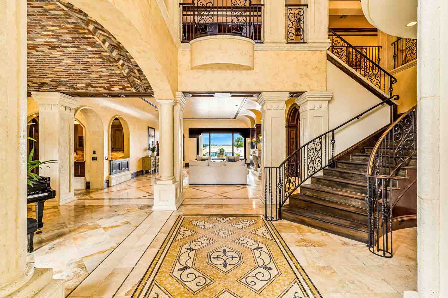 Custom iron staircase railing detail inside Villa Esperanza, a Bella Collina luxury home